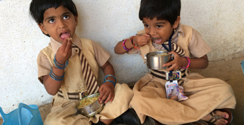Photo of school children eating