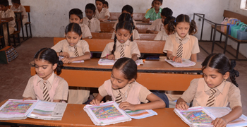 Photo of school children at desks
